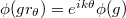 $\phi(g r_\theta)=e^{ik\theta}\phi(g)$